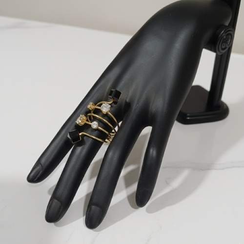 Elegant Multi-Band Gold Ring with Black and Clear Stones