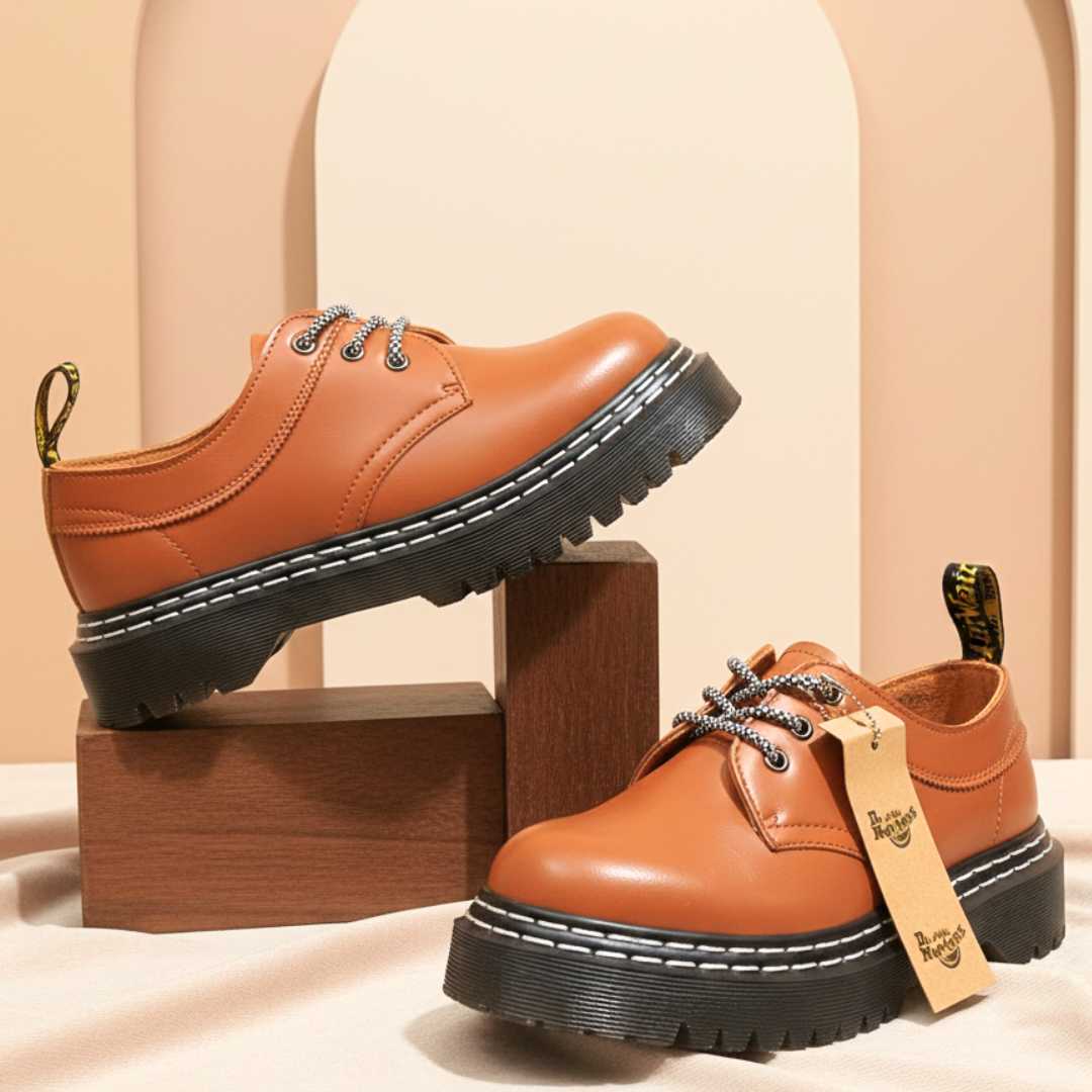 Luxury orange statement shoes for a bold fashion outfit